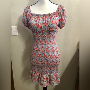 Dress with puff sleeve. Fits to the shape. Never been worn.